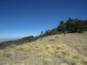 Cheetah and Jerry hiking along the spine of the Huachuca Mountains on Arizona Trail Passage 1.