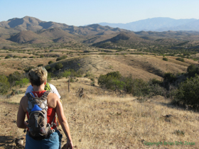 Cheetah and Jerry hiking a ridgeline.