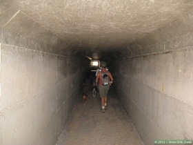Jerry and Andrea in the tunnel going under I-10 on Passage 7 of the Arizona Trail