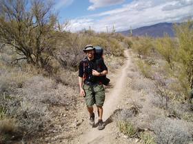 Brian nearing La Selvilla campground at Colossal Cave while hiking the Arizona Trail, Passage 8
