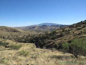 Layers of hills march off in the distance.