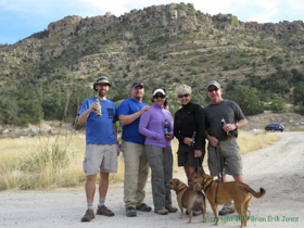 Brian, Shaun, Raquel, Andrea (Cheetah) and Jerry enjoy a post passage libation while Siyeh and Kintla watch a squirrel.