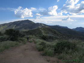 Jerry and Kintla descending out of the Santa Catalina Mountains.