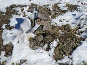 Snow drift on a cairn along Arizona Trail Passage 14.