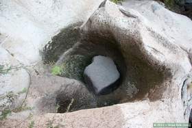 A huge boulder trapped in an even larger scour hole in Horse Camp Canyon