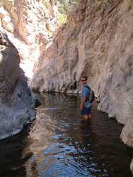 Jeff wading up Hannah Creek