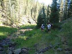 Brad and Lori make their way down Fish Creek.