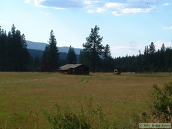 A derelict ranch house and a dozer on the way to Running Horse B&B.