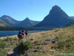 Jerry, Andrea and Shan hiking along Lower Two Medicine Lake.