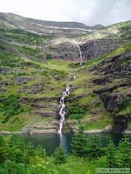 The large waterfall plunging in to Beaver Woman Lake's companion lake.