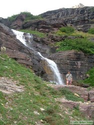 Here I am by the large waterfall at Beaver Woman Lake.