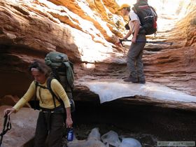 Mindy and Steve descending the icy pour-off in Bullet Canyon.  I'm not a big fan of hiking with poles, but at this point I'm beginning to think that ski poles might not be a bad idea . . .  