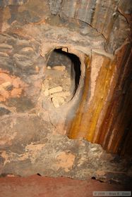 Ancient maize cobs in an alcove inside the restored kiva at Perfect Kiva Ruin in Bullet Canyon.