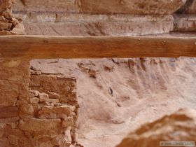 Brian ascending a rock face to an unnamed cliff dwelling.