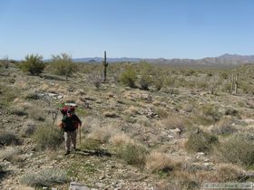 Jerry hiking along the base of the Harcuvar Mountains..