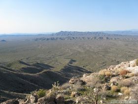 The view northwest from the saddle that we camped at.  Jerry's truck can be seen at the end of the road near the center of the photo..