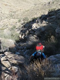 Jerry ascending the rocky defile..