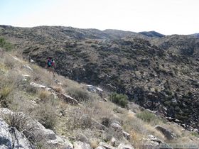 Jerry navigating down an extremely rocky slope.