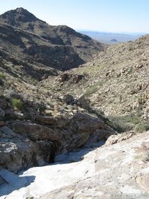 The wash becomes a steep, slippery chute below this point.