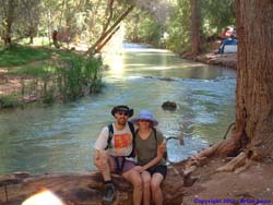 Brian and Shannon, already having a seat, only 300 yards into the hike!