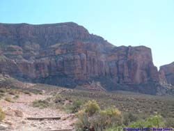 A helicopter landing on Hualapai Hilltop.