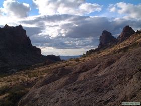 Grassy gold graces the Kofas where miners once mined for the mineral kind.