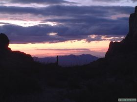 Sun setting in Kofa Queen Canyon.