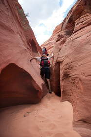 Steve and Chuck exploring a sculpted sandstone wash in Coyote Buttes North.