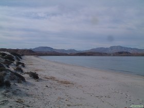 Looking west down the beach at Ensenada Alcatraz.