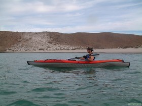 Here I am enjoying paddling in the waves (though they're not very big)