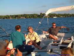 The family enjoying a lovely evening out on the water.