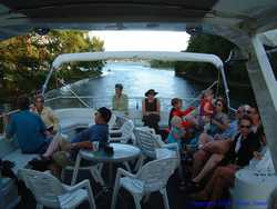 The family enjoying a lovely evening out on the water.