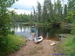 Shan jacketed up and ready to start paddling.