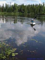 Shan paddles the kayak around solo.