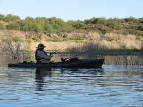 Dad fishing in a cove near Schoolhouse Point.