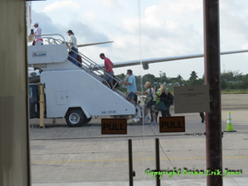Boarding at the international airport in Belize is done the old fashioned way, by walking up a mobile stairway.