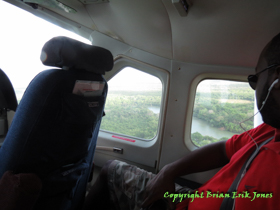 Pete looks out on the terrain as we fly from Belize City to Placencia, then Punta Gorda.