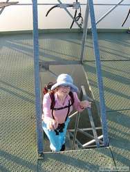 Shan cresting the long stairway up the 50 meter tower.