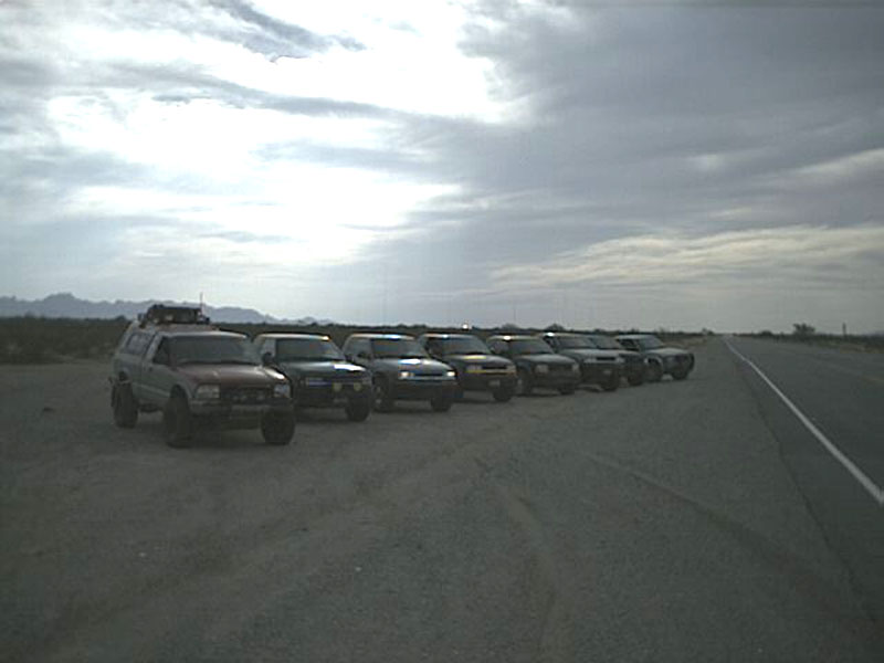 From Right to left:  Myself (Brian aka WolfSoul) and Shannon, red/pewter '98 x-cab HighRider; Kyle and Jauri, green '98 x-cab ZR2; Brett, pewter '98 xcab ZR2; John R., black '00 ZR2; Shane and Raylynn, black '99 ZR2; Brian D., pewter '00 xcab ZR2; Ron, black '94 HighRider; Mikey, pewter '00 xcab ZR2.