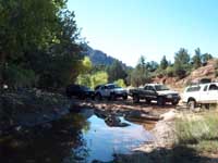 The group approaches the frontier cabin.