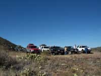 The five remaining indians pose on a hill opposite the unsuspecting town of Jerome.