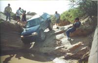 Randy descends the rock face.